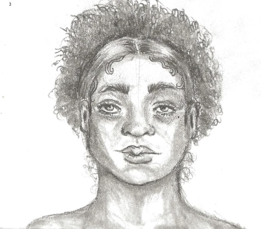 Graphite portrait of a person with curly hair, drawn from observation